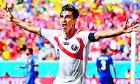 Costa Ricas forward Bryan Ruiz celebrates after scoring his teams first goal during a Group D match on Friday