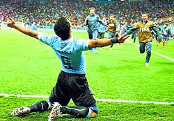 Luis Suarez celebration after the second goal left no one in doubt that the Roy Hodgson's team was on its knees in Sao Paulo
