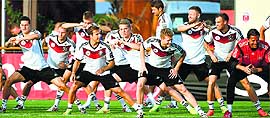 Germanys players warm up during a training session ahead of their match against Ghana in Santo Andre