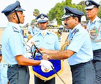 Chief of the Air Staff Air Chief Marshal Arup Raha (R) presents the Sword of Honour to Flying Officer Anil Kumar in Hyderabad on Saturday
