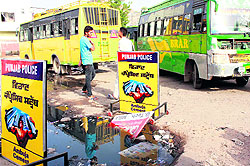 A view of the stagnant sewage in the four-feet deep pothole