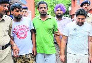 The accused in police custody in Chandigarh on Sunday.