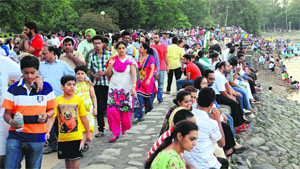 People enjoy pleasant weather at Sukhna Lake in Chandigarh on Sunday.