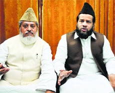 Maulana Syed Athar Dehalvi (right) talks to mediapersons in Jammu on Sunday.
