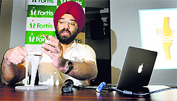 Dr Harsimran Singh, director of Joint Replacement at Fortis Hospital, Mohali, addresses a press conference in Ludhiana on Sunday.