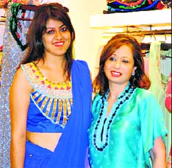 A model wearing a designer pre-draped Egyptian style saree with Rupam Grewal