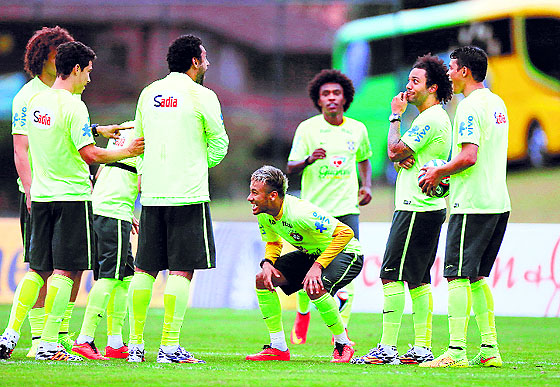 Brazilian players laugh during a training session in Teresopolis, near Rio de Janeiro