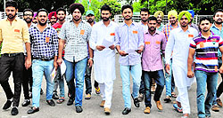 PUSU members come out of the VC's office after submitting a memorandum at Panjab University on Monday
