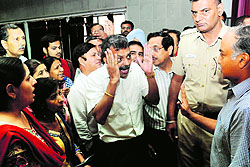 GMCH-32 Director Dr Atul Sachdev (extreme right) tries to pacify angry parents who disrupted counselling for MBBS seats in Chandigarh on Monday