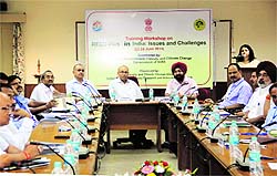 Forest officials from various states participate in a workshop at ICFRE in Dehradun on Monday.