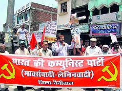Workers of the CPI (ML) protest against the hike in railway fare and freight charges in Nainital on Monday.
