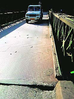 The rickety wooden bridge at Deothal in Narag panchayat of Sirmaur district has made driving on it risky.
