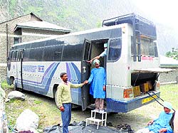 A patient comes out of the mobile operation theatre of the Palampur Rotary Eye Foundation at a camp organised at Holi in Chamba.