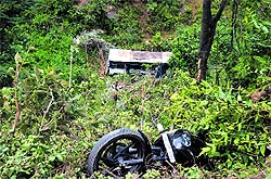 A bus fell into a deep gorge after crushing two bike riders at Majhwar village near Mandi on Monday.