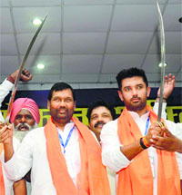 LJP chief Ram Vilas Paswan and his son Chirag Paswan in New Delhi on Monday.