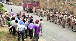The police team and court officials help the MBD Group in taking over the possession of MBD Krishna Project in Jalandhar on Tuesday.