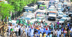 Activists of the Peoples Democratic Party protest against power cuts and water shortage in Jammu on Tuesday. Tribune photo: Inderjeet Singh
