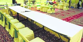 Empty chairs at the auction of a prime chunk of PUDA land in Ludhiana on Tuesday.