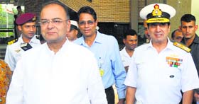 Navy Chief Admiral RK Dhowan (R) looks on as Defence Minister Arun Jaitley leaves after the Navy Commanders conference in New Delhi on Tuesday.