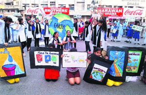 Students perform a flash mob at various places in the city on Wednesday.