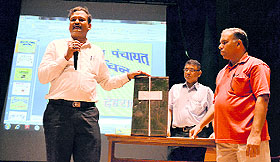 Dehradun District Panchayat Officer MM Khan imparts training in the counting of votes to polling staff in Dehradun on Wednesday.
