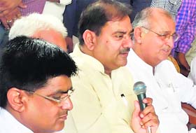 Abhay Singh Chautala addresses a meeting at Sirsa's Madhosinghana village on Wednesday.