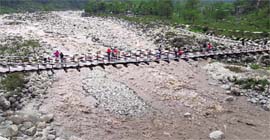 The Neugal river in flood after a cloudburst in the Dhauladhar hills.