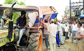 Officials remove encroachments during a drive in Jagraon on Wednesday. 