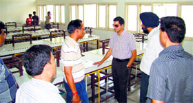 Deputy Commissioner Rajat Aggarwal inspects the meritorious school in Ludhiana on Wednesday.