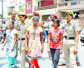 Girls who work as domestic help being rescued by a task force on Wednesday.