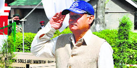 Minister of State for Defence Rao Inderjit Singh takes salute at the Armys 15 Corps in Srinagar on Wednesday.