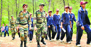 NCC girl cadets during a trekking expedition in the Dhauladhar ranges of Himachal Pradesh