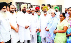 PPCC president Partap Singh Bajwa meets with Congress workers during his visit to Bathinda on Thursday. Tribune photo