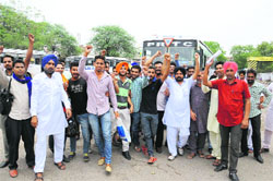 Members of the PRTC Workers Union (Azad) shout slogans in support of their demands in Bathinda on Thursday. Tribune photo