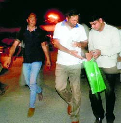 A photo of Inspector Ranjodh Singh (centre) and other cops of the crime branch of Chandigarh Police who came in plain clothes during the encounter at Moga on Wednesday night. The photo was taken from a video footage.