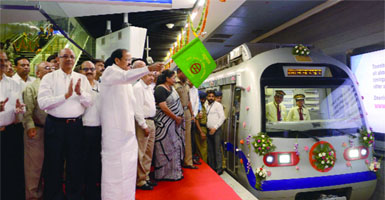 Union Minister of Urban Development M Venkaiah Naidu flags off a train during the opening of the Mandi House-Central Secretariat line at the Mandi House Metro station in New Delhi on Thursday.