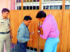MDDA officials seal Panchsheel wedding point in Dehradun on Thursday.