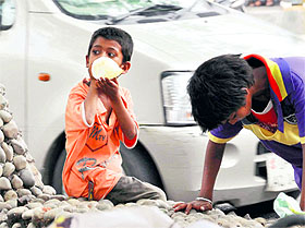 A boy inhales a diluter put up inside a polythene bag at Clock Tower in Dehradun. Most of the street children are addicted to such kind of products due to lack of action on the part of the administration, even as International Day Against Drug Abuse was observed across the country on Thursday. 