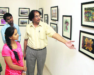 Visitors at the International Photography Show 2014 exhibition organised by TIAS Biennale India at Virsa Vihar in Jalandhar on Thursday.