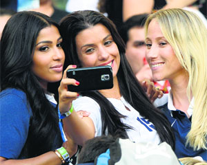 Mazda Magui, the wife of Frances Mamadou Sakho, Ludivine Sagna, Bacary Sagnas wife and Sandra Evra, the wife of Patrice Evra, capture the memories of the World Cup.