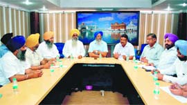 SGPC officials hold a meeting with MC officials in Amritsar on Friday.