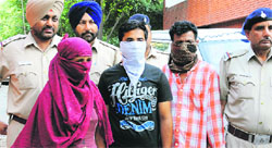 Three accused in police custody at the Sector 11 police station in Chandigarh on Friday. Tribune Photo: S Chandan