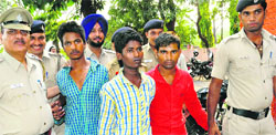 The accused being taken for a medical examination in Chandigarh on Friday. Tribune photo: Parvesh Chauhan