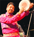 Punjabi singer Gurdas Mann performs at Tagore Theatre in Chandigarh on Friday. Tribune photo: Pradeep Tewari