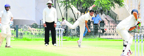 Players in action during a match of the Inter-District Cricket (U-25) Championship at the PCA stadium in Mohali on Friday. Tribune photo: Parvesh Chauhan