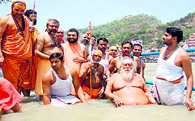Shankaracharya Swami Swaroopanand Saraswati takes a dip in the Ganga on the occasion of amavasya in Haridwar on Friday. 