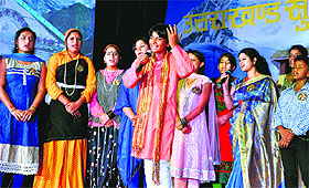 Artistes peform at a musical event at the Town Hall in Dehradun on Friday.