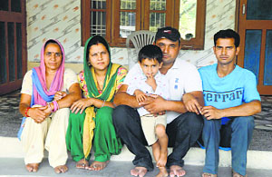 Rakesh Singh with his family members after returning home from Iraq.
