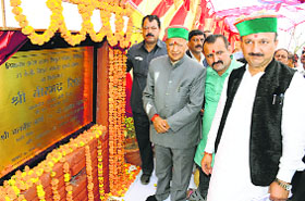 Chief Minister Virbhadra Singh lays the foundation stone of 33 kv sub-station at Kupvi in Shimla district on Friday.