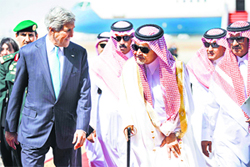 US Secretary of State John Kerry (L) and Saudi Foreign Minister Prince Saud al-Faisal in Jeddah on Friday